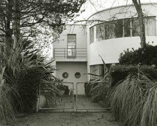 frinton park estate book image showing white modernist villa in black and white