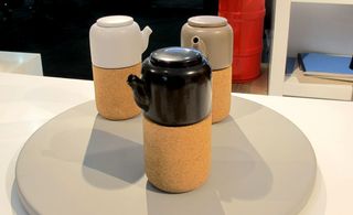Teapots mounted on cork stands