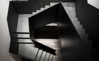 The angular black steel staircase