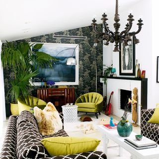 living room with white wall designed sofa and cushions