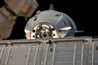 SpaceX's first Crew Dragon is seen closing in on the International Space Station just before docking on March 3, 2019 in this astronaut photo.