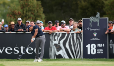 Hennie Du Plessis hits a tee shot