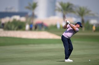 Eddie Pepperell hits an iron shot from the fairway