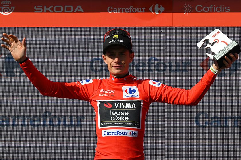 ALTO DE EL MORREDERO, SPAIN - SEPTEMBER 10: Jonas Vingegaard of Denmark and Team Visma | Lease a Bike - Red Leader Jersey celebrates at podium during the La Vuelta - 80th Tour of Spain 2025, Stage 17 a 143.2km stage from O Barco de Valdeorras to Alto de El Morredero 1755m / #UCIWT / on September 10, 2025 in Alto de El Morredero, Spain. (Photo by Tim de Waele/Getty Images)