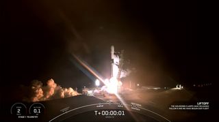 A SpaceX Falcon 9 rocket launches at night, lighting up the California sky.