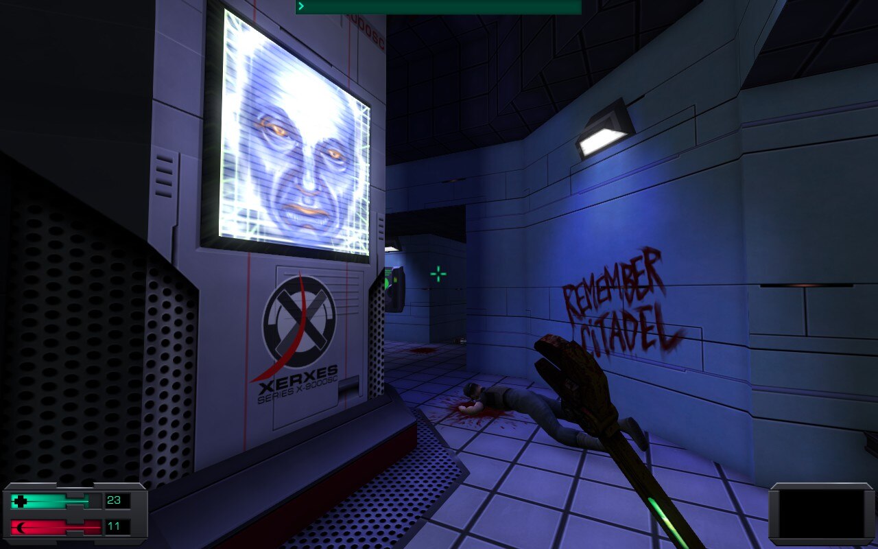 Xerxes computer terminal with "Remember Citadel" graffiti in System Shock 2