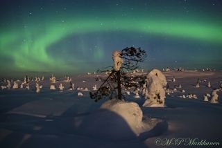 The northern lights show is captured from Finland.