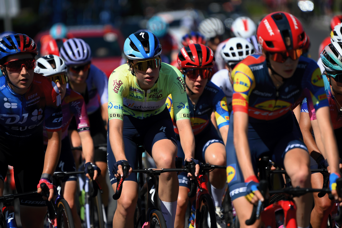 Mischa Bredewold sits in the peloton in the leader's green jersey