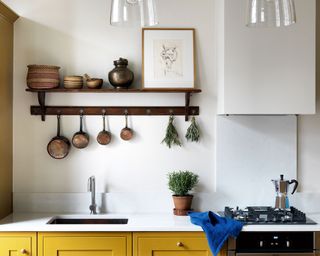 Kitchen without wall cabinets and vintage shelf