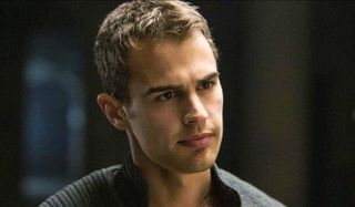 Theo James with a stern look on his face