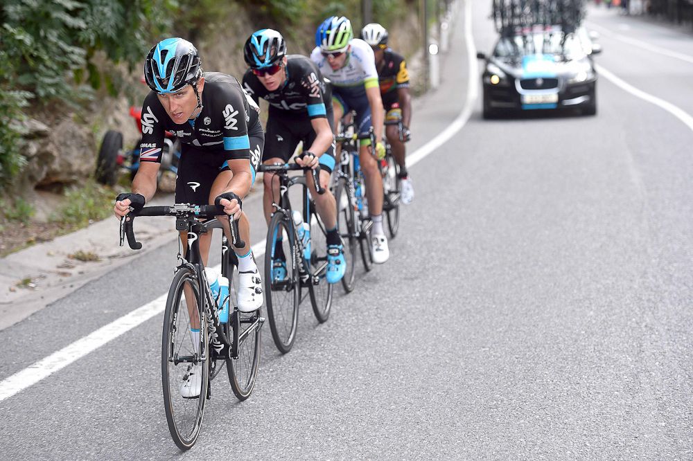 Geraint Thomas guides Chris Froome during stage 11.