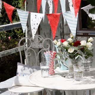 garden party with bunting and drinks