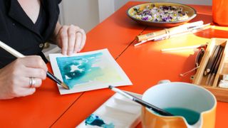 The best watercolour paper with someone painting on it