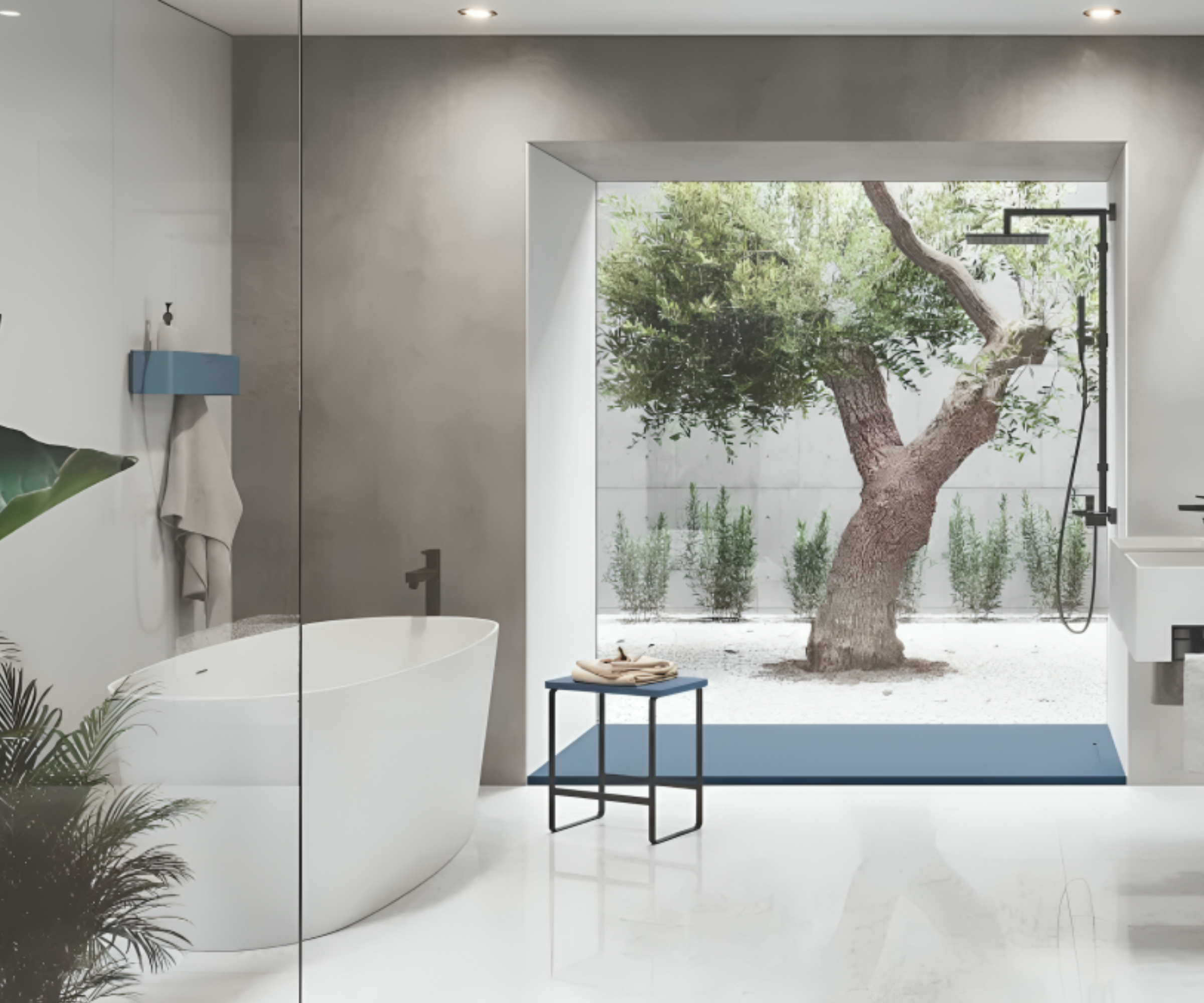 Downstairs bathroom idea with freestanding bath and view onto garden with tree