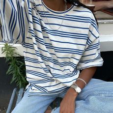 Woman in stripe t-shirt and jeans