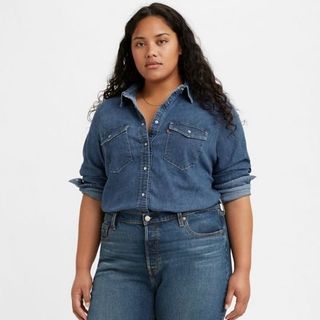 model wearing denim shirt with jeans