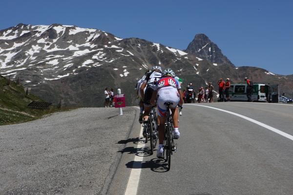 The chase group approach a summit.