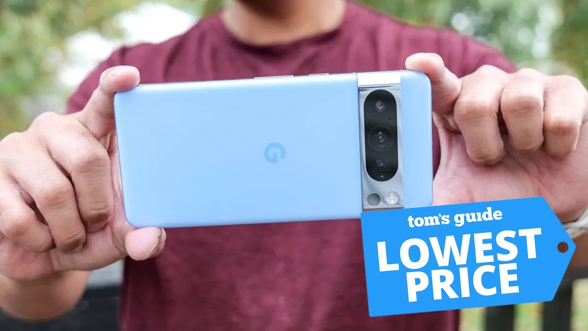 Pixel 8 Pro being held with a Prime Day banner