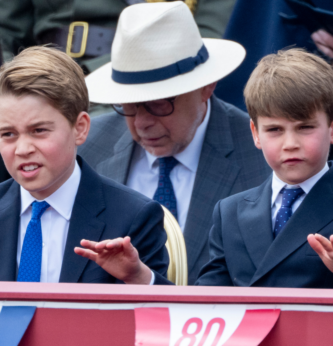 Prince George and Prince Louis sitting at the VE Day 80th parade