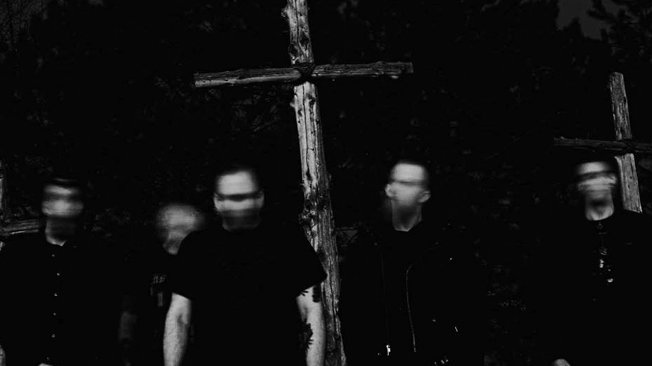 A press shot of Sunlight&#039;s Bane holding a crucifix