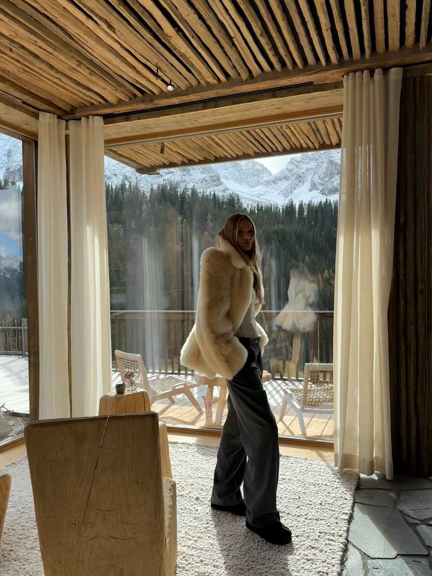 Rosie Huntington-Whiteley wears a fur jacket