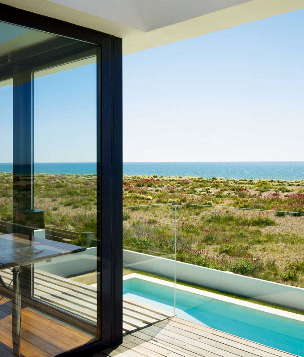 This swimming pool is part of a Modernist style home on the coast of West Sussex