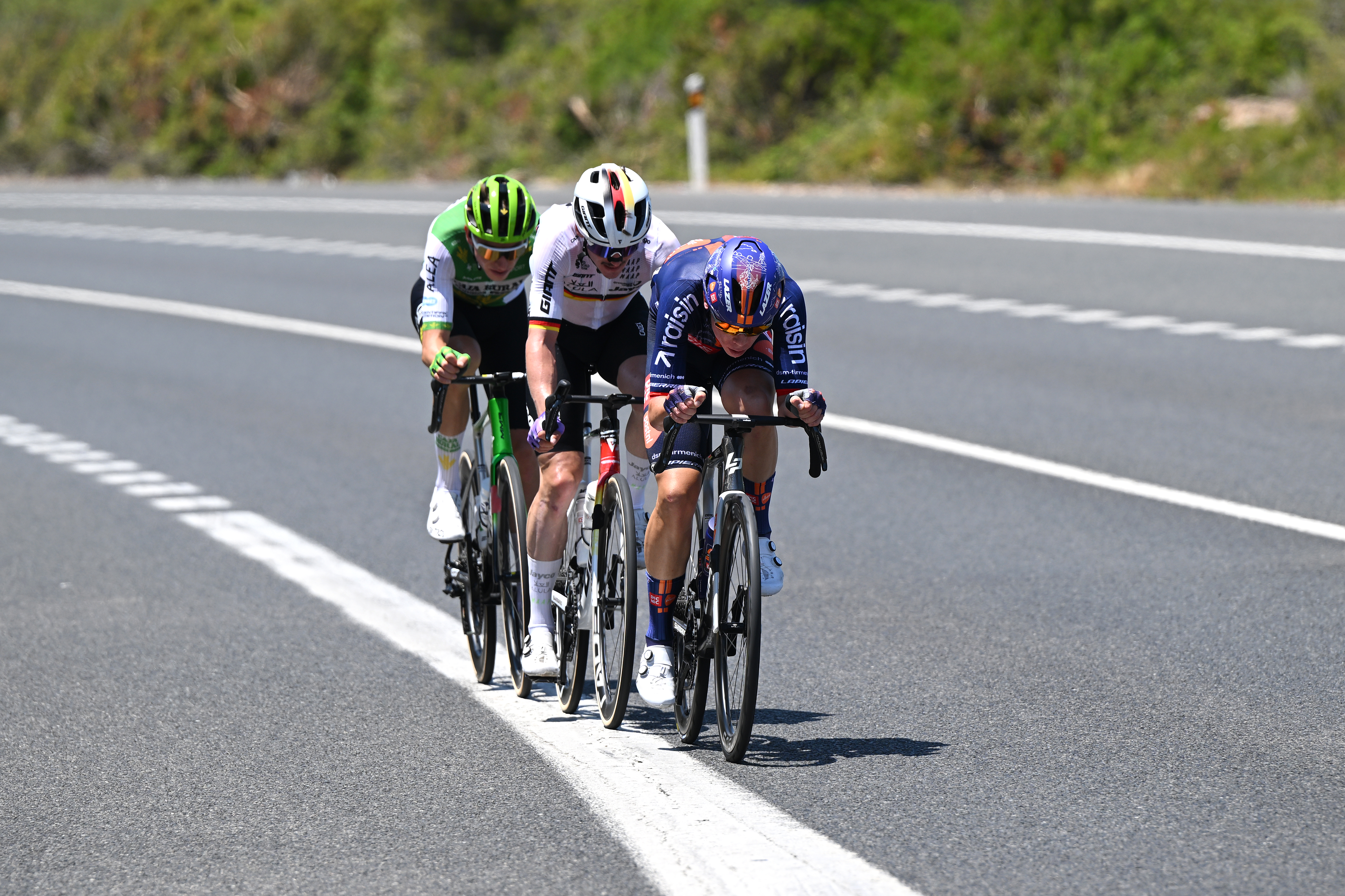 TARRAGONA, SPAIN - JULY 05: (L-R) Alex Molenaar of Netherlands and Team Caja Rural - Seguros RGA, Felix Engelhardt of Germany and Team Jayco AlUla and Frank van den Broek of Netherlands and Team Picnic PostNL compete in the breakaway during the 113th Tour de France 2026, Stage 2 a 168.5km stage from Tarragona to Barcelona 109m / #UCIWT / on July 05, 2026 in Tarragona, Spain. (Photo by Dario Belingheri/Getty Images)