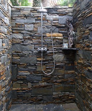 Exterior natural stone shower cubical