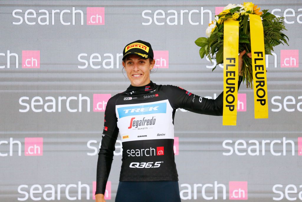 LENZERHEIDE SWITZERLAND JUNE 21 Lucinda Brand of The Netherlands and Team Trek Segafredo celebrates winning the black points jersey on the podium ceremony after the 2nd Tour de Suisse Women 2022 Stage 4 a 985km stage from Chur to Lantsch Lenz tourdesuisse2022 on June 21 2022 in Lenzerheide Switzerland Photo by Heinz ZwickyGetty Images