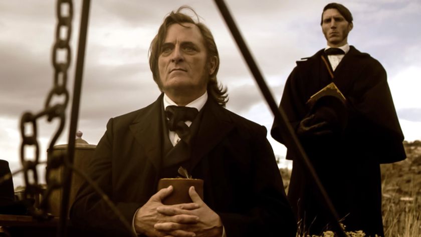 (L to R) Kim Coates as Brigham Young and Alex Breaux as Wild Bill Hickman in Episode 102 of &quot;American Primeval.&quot;