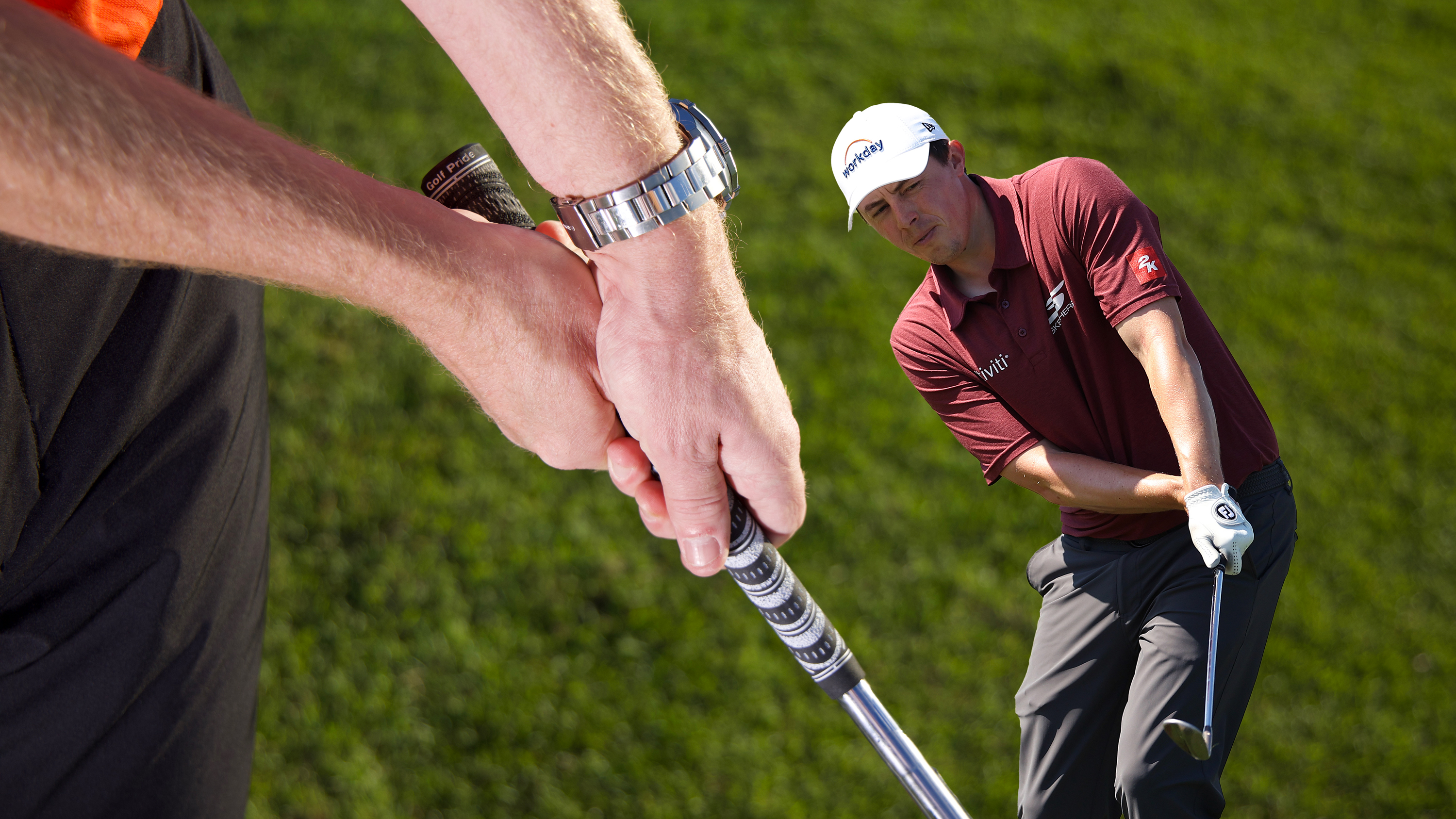 A close up of the cross-handed chipping hand position and grip, demonstrated by top PGA pro Ged Walters, with an inset image of PGA Tour player Matt Fitzpatrick using the technique at the US Open