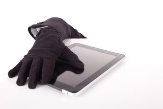 Hand stealing iPad