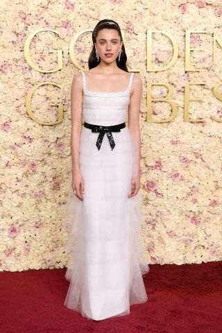 Margaret Qualley arrives on the 2025 Golden Globes red carpet.