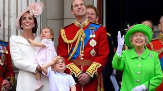 Catherine, Duchess of Cambridge, Princess Charlotte, Prince George, Prince William, Duke of Cambridge, Prince Harry, Queen Elizabeth II and Prince Philip, Duke of Edinburgh stand on the balcony during the Trooping the Colour, this year marking the Queen's 90th birthday at The Mall on June 11, 2016 in London, England.