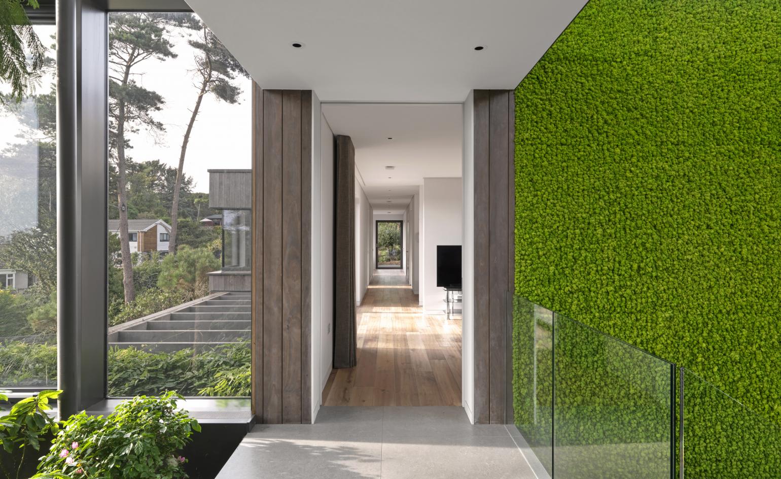 hallway with glass handrail