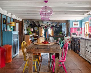 Colorful kitchen diner in Grade II listed farmhouse in Sussex