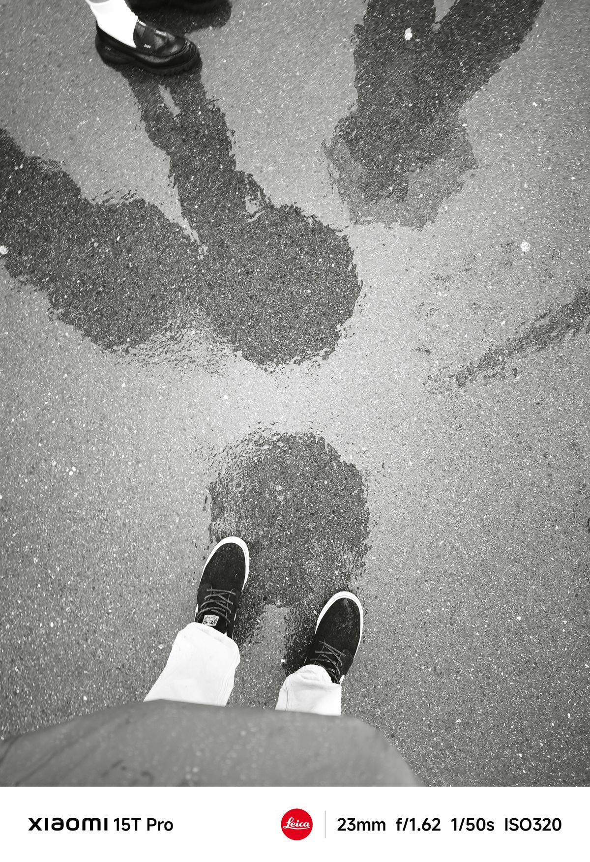 Reflections on a rainy concrete surface