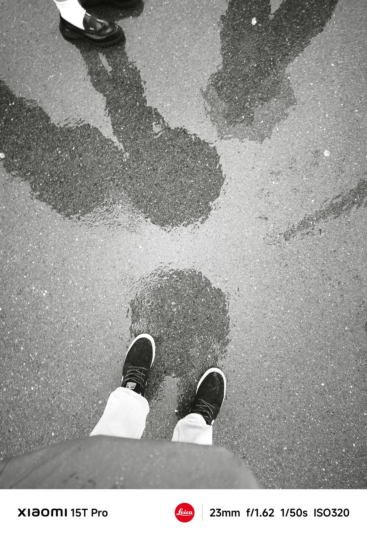 Reflections on a rainy concrete surface