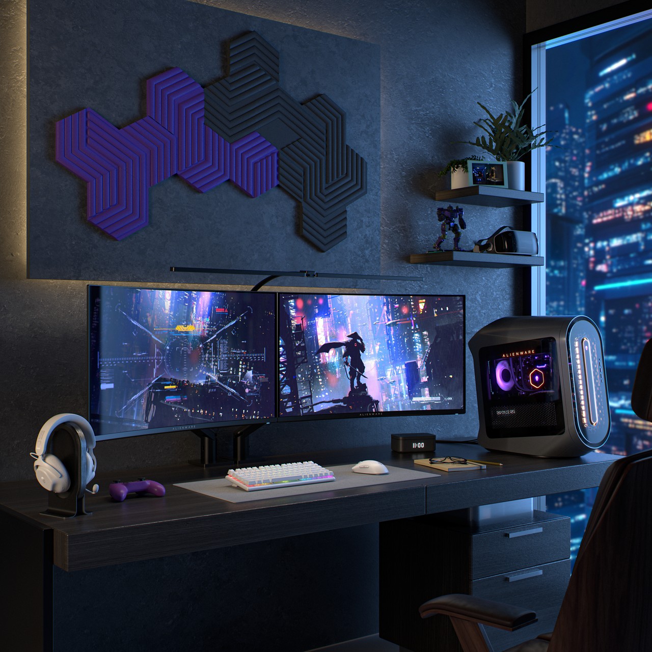 Complete Alienware gaming setup with desktop PC, monitor, keyboard, mouse, and headset