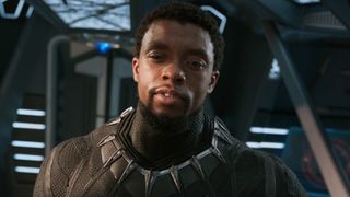 King T'Challa (Chadwick Boseman) looks on in Black Panther.