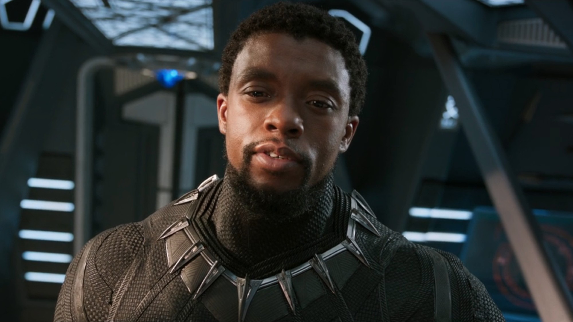 King T'Challa (Chadwick Boseman) looks on in Black Panther.