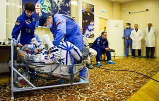 Expedition 40 Preflight Suit Check