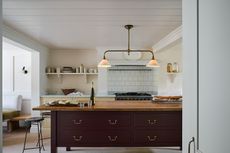 Burgundy kitchen island by deVOL
