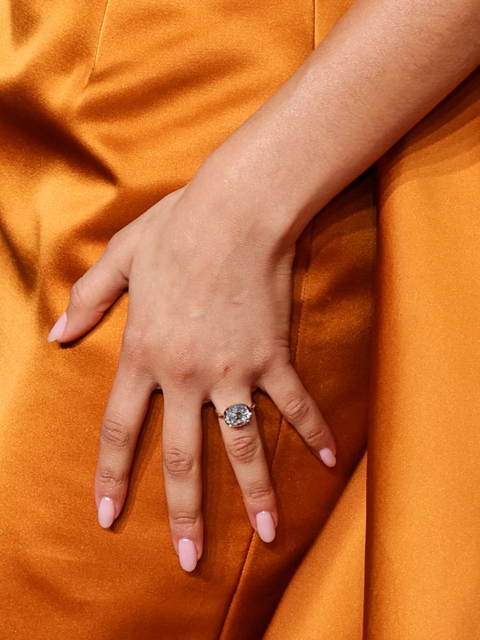 Zendaya at the Golden Globes wearing strawberry milk nails