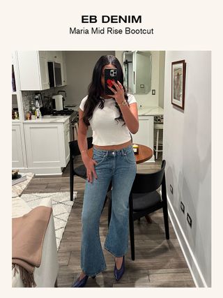 Sierra Mayhew, fashion editor, reviewing jeans.