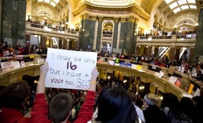 Protesters take over the Madison, Wisc. State Capital Wednesday in an angry reaction to Gov. Scott Walker's public sector budget cuts.
