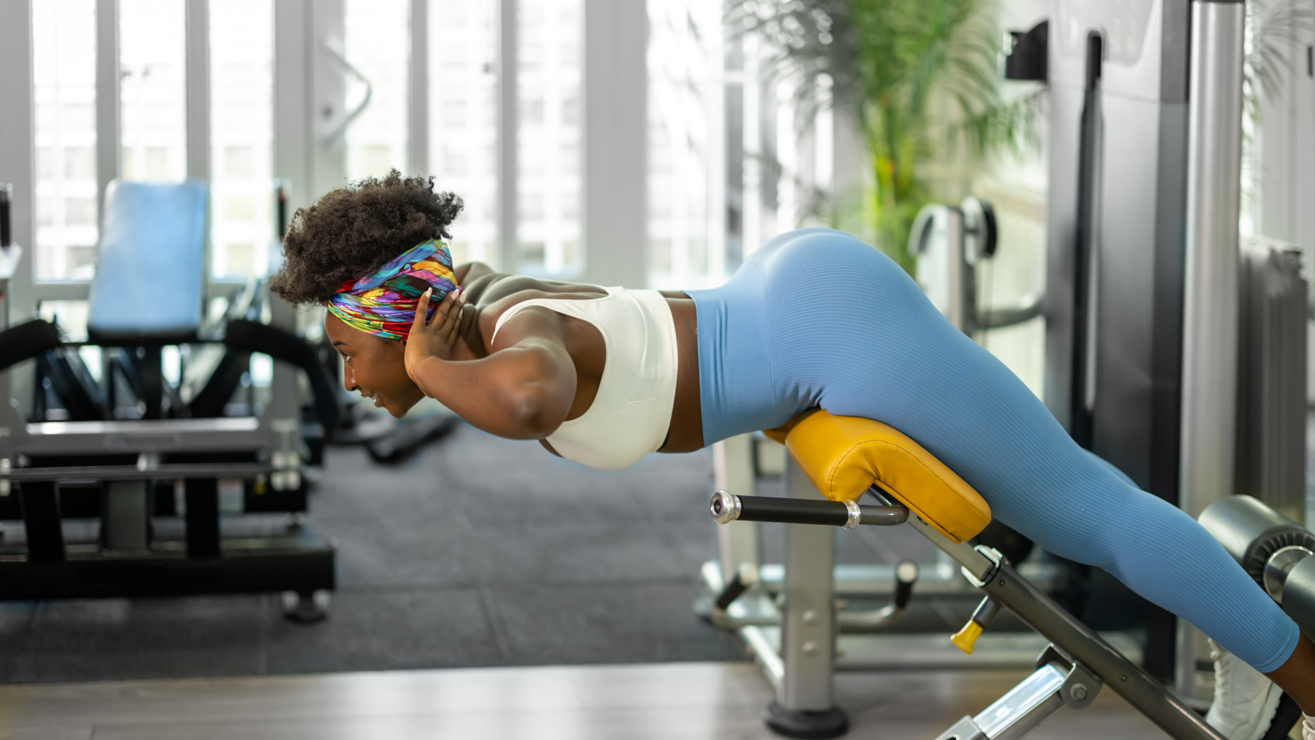 A woman performing a 45 degree back extension