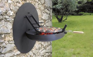 the steel Sigmafocus BBQ, designed to be attached to an outside wall