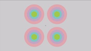 The shifting sizes and colors of the circles combine multiple visual illusions