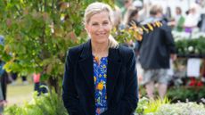 Sophie, Duchess of Edinburgh, wearing a blue floral dress and corduroy blazer, attends the Royal Windsor Flower Show